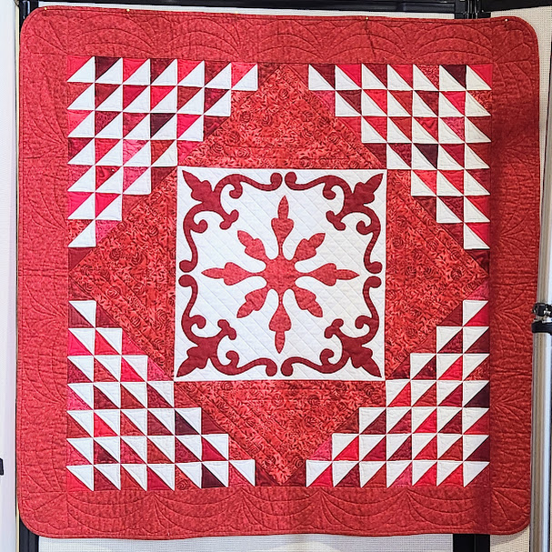 red and white quilt from the Krotz Springs show.